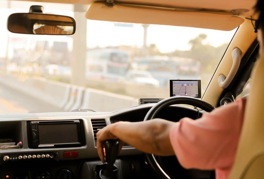person driving following a sat nav