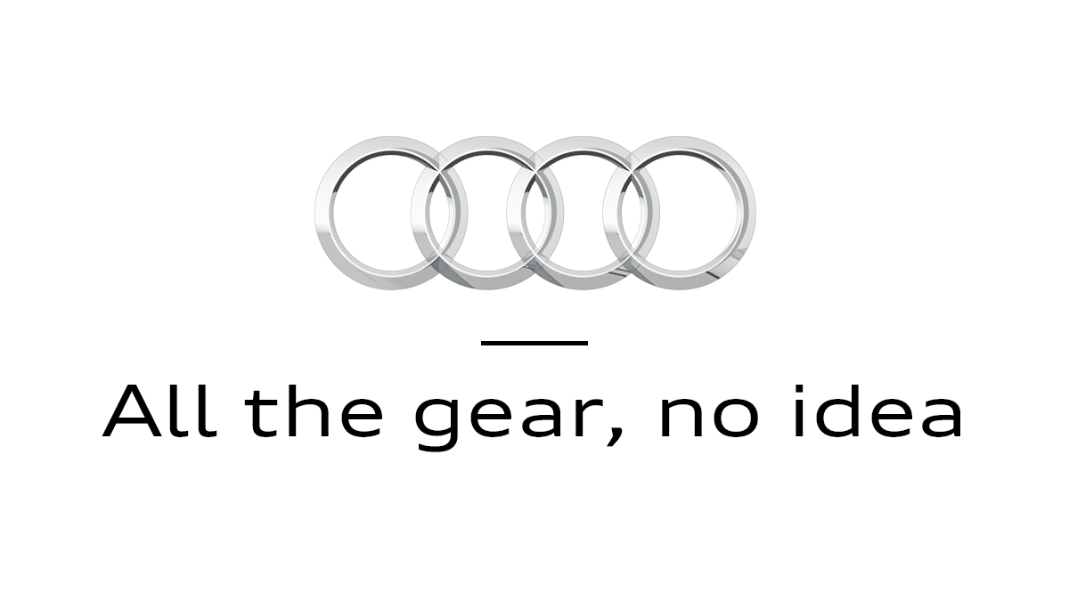 Audi Logo with the slogan: All the gear, no idea