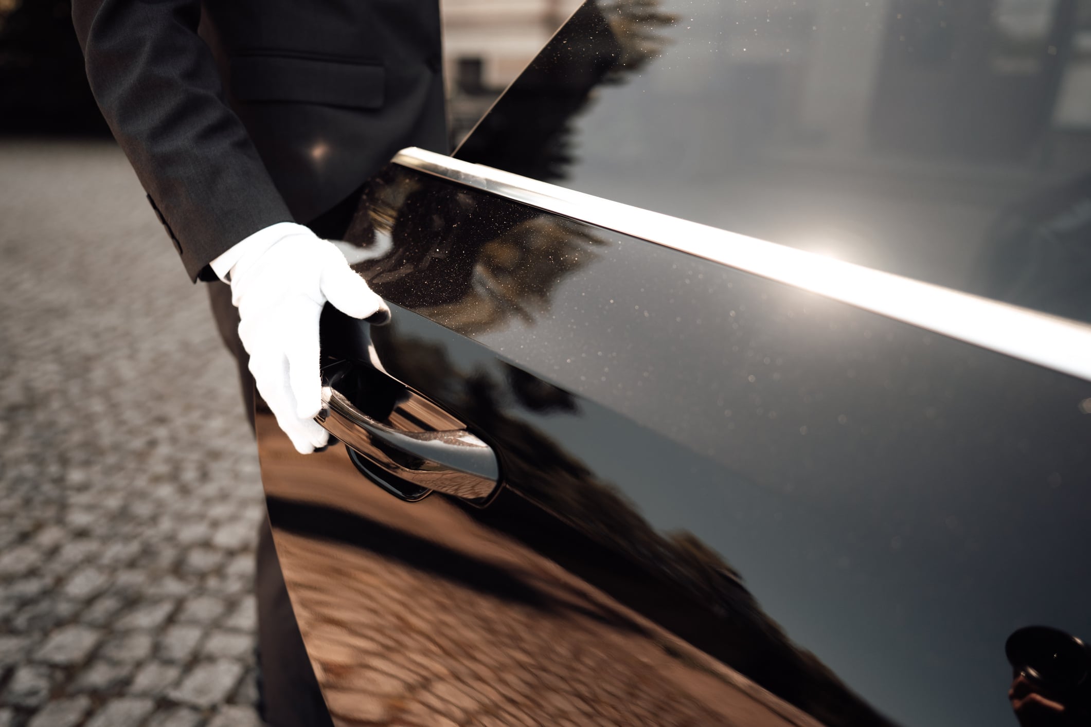 a driver opening the car door